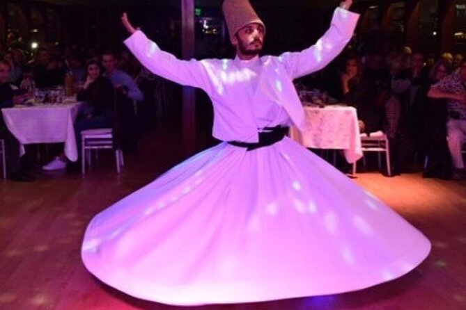 Bosphorus Dinner Cruise & Live Show – Private Table - Dolmabahce Palace and the European shore