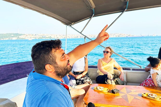 Bosphorus & Golden Horn: Sunset Yacht Cruise with Expert Guide - Ortaköy Mosque beneath the first bridge