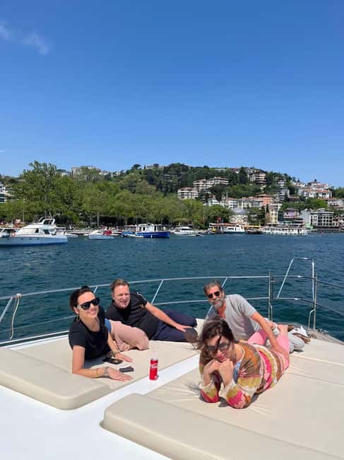 Bosphorus Sunset Yacht Cruise with Guide & Snacks - Galata Bridge and Galata Tower from the water
