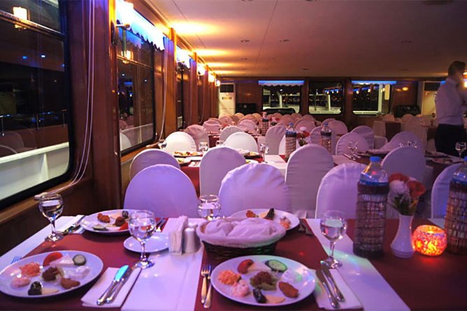 Istanbul Bosphorus Cruise with Dinner and Entertainment - Dinner, drinks, and the table setup