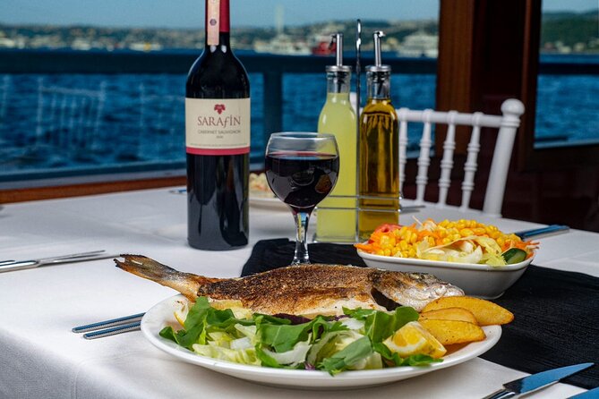 Istanbul Bosphorus Dinner Cruise with Drinks and Shows - The opening view: Dolmabahçe and Çırağan Palace