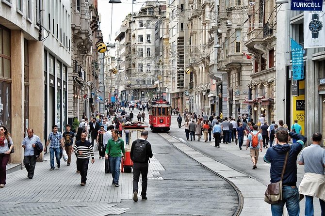 Istanbul Food Walking Tour of Beyoglu by Night - Walking Istiklal Caddesi toward the old Pera streets