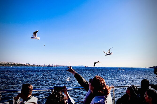 Istanbul Guided Street Food Tour Around European and Asian Sides - Returning to Karaköy for fish wrap