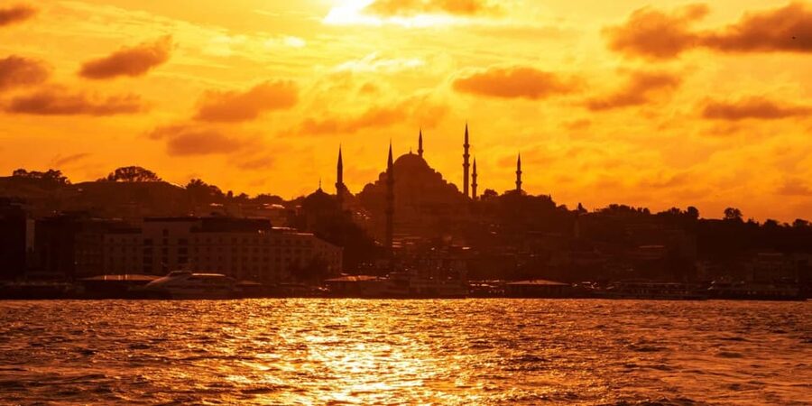 Istanbul: Morning or Sunset Cruise with Guide and Snacks - Ciragan Palace and the Bosphorus Bridge